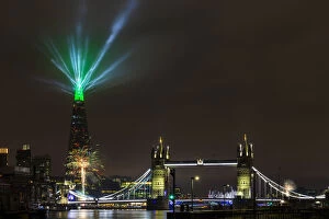 Tower Bridge Collection: New Year 2022 firework and light display by The Shard and Tower Bridge, London, England