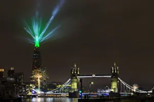 Light Beam Prints: New Year 2022 firework and light display by The Shard and Tower Bridge