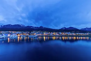 Hemisphere Prints: Night lights reflect on water in Ushuaia