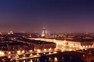 Enchanting Prints: Night Skyline of Turin, street lights at Piazza Vittorio Veneto and Mole Antonelliana