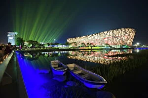 Images Dated 15th August 2008: A night time light show at the Birds Nest National Stadium during the 2008 Olympic Games