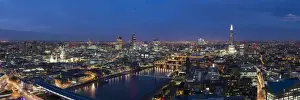 Urban Sprawl Prints: A night-time panoramic view of London and the River Thames from the top of Southbank Tower