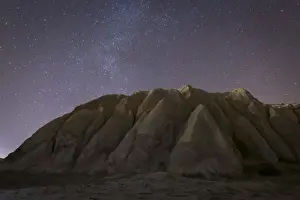 Night Sky Prints: Night time in the Rose Valley showing the rock formations and desert landscape light painted with torches