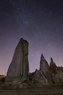 Night Sky Prints: Night time in the Rose Valley showing the unusual rock formations and desert landscape light painted