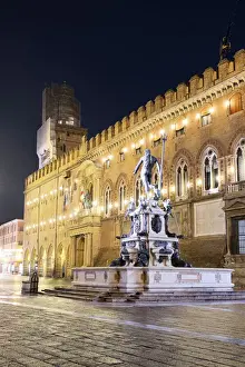 Bologna Prints: Night view of the fountain of Neptune and d Accursio municipal palace in