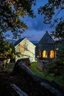 Stillness Prints: Night view of Tiri monastery with illuminated bell tower in the dark sky