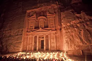 Nightime tourist show in candlelight, in front of the Treasury (El Khazneh)
