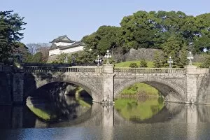 Niju Bashi bridge reflecting in moat, Imperial Palace, Tokyo, Japan, Asia