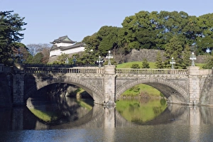 Images Dated 18th December 2009: Niju Bashi bridge reflecting in moat, Imperial Palace, Tokyo, Japan, Asia