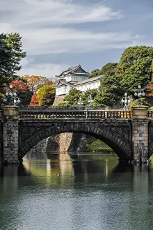 Japanese Culture Prints: Nijubashi bridge over the moat and a guard tower in the Imperial Palace of Tokyo in autumn