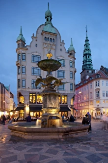 Nikolaj Church and restaurants at dusk, Armagertorv, Copenhagen, Denmark