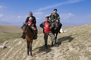Nomad family with horses, Song Kol, Kyrgyzstan, Central Asia, Asia