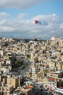 Historical Site Prints: North-East district with the Jordanian flag on a 126m flagpole in front of the Raghadan Palace in the background