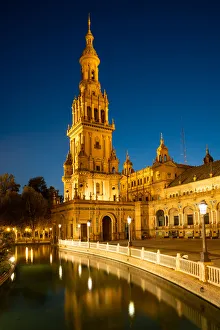 Street Light Prints: The North Tower of Plaza de Espana lit up at night, Parque de Maria Luisa, Seville