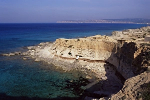 Crumbling Prints: Northern coast of the island near Cala Encaste