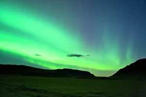 Glowing Prints: The Northern Lights (Aurora Borealis), Vik, Iceland, Polar Regions