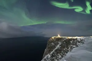Northern Lights (Aurora Borealis) over North Cape cliff in winter, Mageroya island