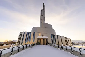 Footpath Prints: Northern Lights Cathedral, titanium clad, deep snow in winter, sunset, Alta