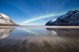 Troms County Prints: Northern lights and stars light up the sandy beach framed by snowy peaks, Ersfjord