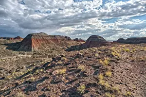 Stunning Prints: Northside view shows Teepees at Petrified Forest National Park in Arizona with clouds above and rocky terrain below