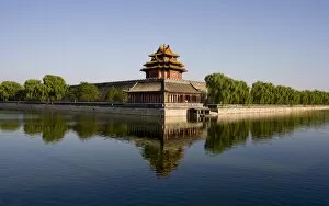 The northwest corner tower and water filled moat surrounding The Forbidden City