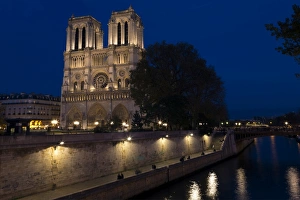 Floodlit Prints: Notre Dame Cathedral and River Seine at night, Paris, France, Europe