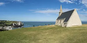Etretat Prints: Notre-Dame de la Garde chapel and Porte d Aval in the background, Etretat, Normandy
