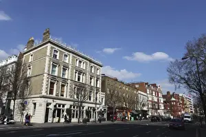 Notting Hill Prints: Notting Hill Gate leads into Bayswater Road in west Londons Notting Hill
