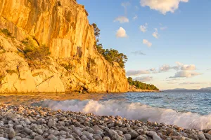 Traditionally Croatian Prints: Nugal Beach near Makarska at sunset, Croatia, Europe