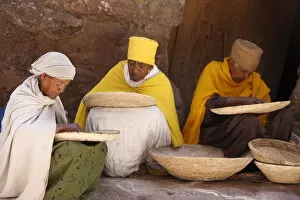 Images Dated 23rd February 2010: Nuns sorting wheat in Bet Maryam church courtyard, Lalibela, Wollo, Ethiopia, Africa
