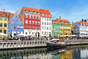Boys Prints: Nyhavn harbour with colourful houses reflected in the waters channel