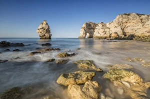 Lagoa Municipality Prints: Ocean waves and cliffs at sunrise, Praia da Marinha, Caramujeira, Lagoa Municipality