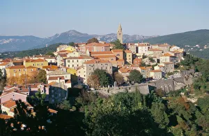 Ochre and pastels at sunset, medieval hilltop town, Labin, Istria, Croatia, Europe Ochre and pastels at sunset, medieval hilltop town, Labin, Istria, Croatia, Europe