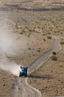 Off-road driving over dusty country road, Karakol desert, Turkmenistan