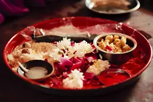 Trays Prints: Offering to the Hindu gods durring the tonsuring (mundan) of a small boy