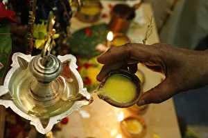 Lamps Prints: Oil lamp in a Sri Lankan temple, Paris, France, Europe