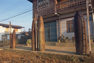 Warfare Prints: Old B-52 bombs used in town, Xieng Khuang Province, Phonsavan, Laos, Indochina