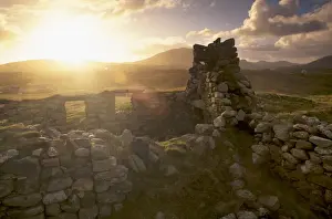 Sun Beam Prints: Old blackhouse ruin near Timsgarry (Timsgearraidh) at sunset