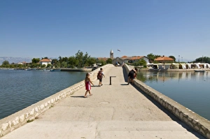 Images Dated 14th August 2008: Old bridge leading to the town of Nen, Croatia, Europe