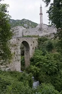 Old bridge in front of the medieval Castle with minaret, Travnik, Bosnia-Herzegovina