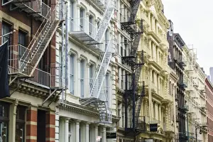 Fire Escape Prints: Old buildings and fire escapes in the Cast Iron District of SoHo, Manhattan, New York City