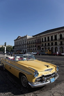 Old car outside the Capitolio, Havana, Cuba, West Indies, Central America