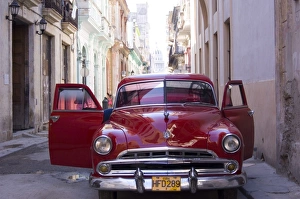 Cuban Prints: An old car in a small street in Habana Vieja (old town), Havana, Cuba, West Indies