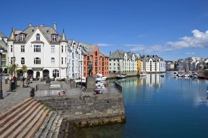 Alesund Prints: Old fishing warehouses in harbor