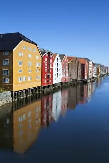 Images Dated 24th June 2009: Old fishing warehouses reflected in the River Nidelva, Trondheim, Sor-Trondelag, Norway