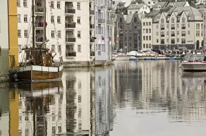 The old harbour, fishing trawler and motor craft, Alesund, Norway, Scandinavia, Europe