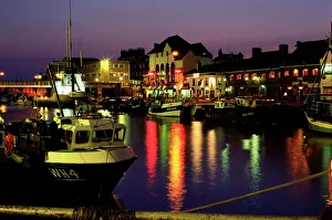 Illumination Prints: The Old Harbour, illuminated at dusk, Weymouth, Dorset, England, UK, Europe