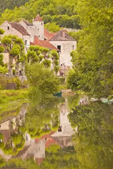 Yonne Prints: Old houses of the village of Noyers sur Serein reflecting in the River Serein