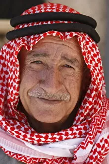 Old Jordanian man wearing a keffiyah scarf, Petra, Jordan, Middle East
