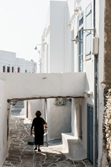 Sifnos Prints: Old lady in black with stick and shopping walking home, Kastro Village, Sifnos, Cyclades